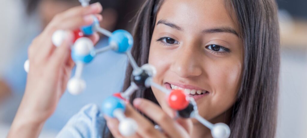 KS2 pupils taking part in a practical science activity during a primary lesson